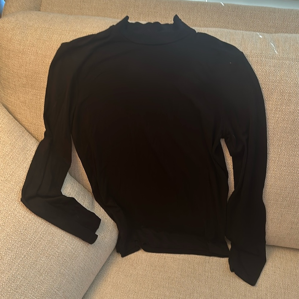 Black rayon and Lycra mock turtleneck size medium.